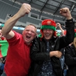 MINSK, BELARUS - MAY 17: Belarus fans cheering on their team during preliminary round action against Germany at the 2014 IIHF Ice Hockey World Championship. (Photo by Andre Ringuette/HHOF-IIHF Images)